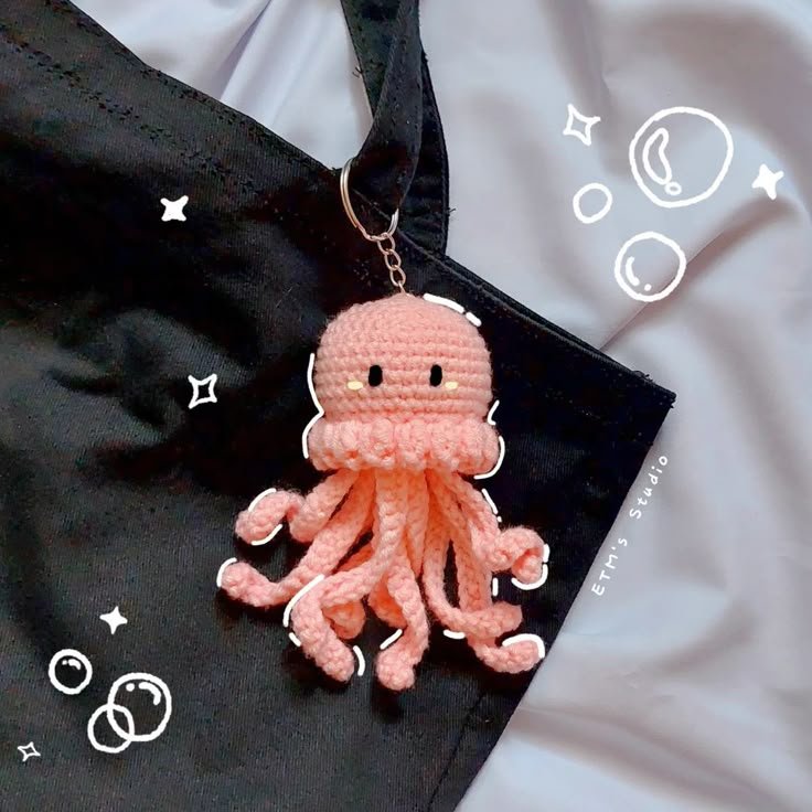 Ei Thel Mon on Instagram_ _These days I'm into jellyfish! I kept seeing jellyfish beaded keychains and wanted to make in crochet version_ I know it sounds off but I…_